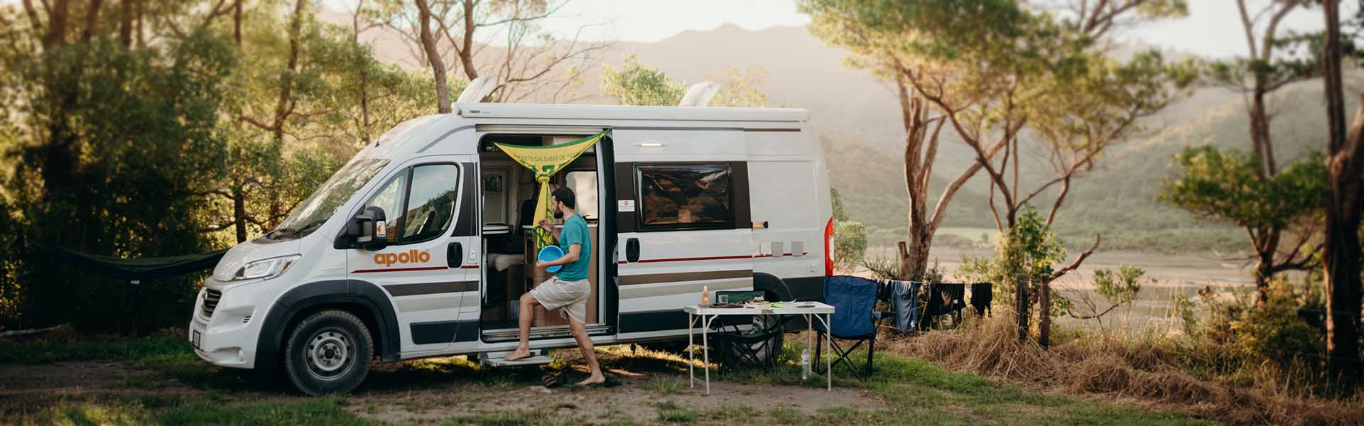 Couple camping in rental motorhome in New Zealand